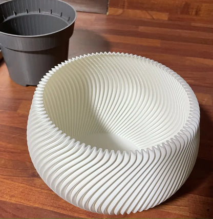 Pot de plante tordu