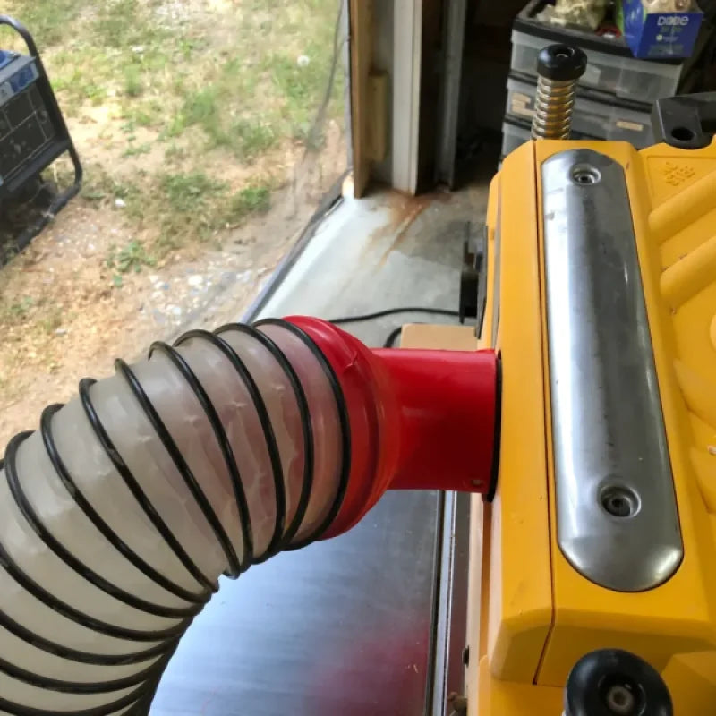 Sortie d’évacuation inclinée pour raboteuse Dewalt DW735