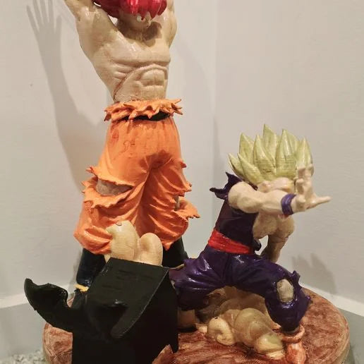 Support pour casque et manette de Goku et Gohan.